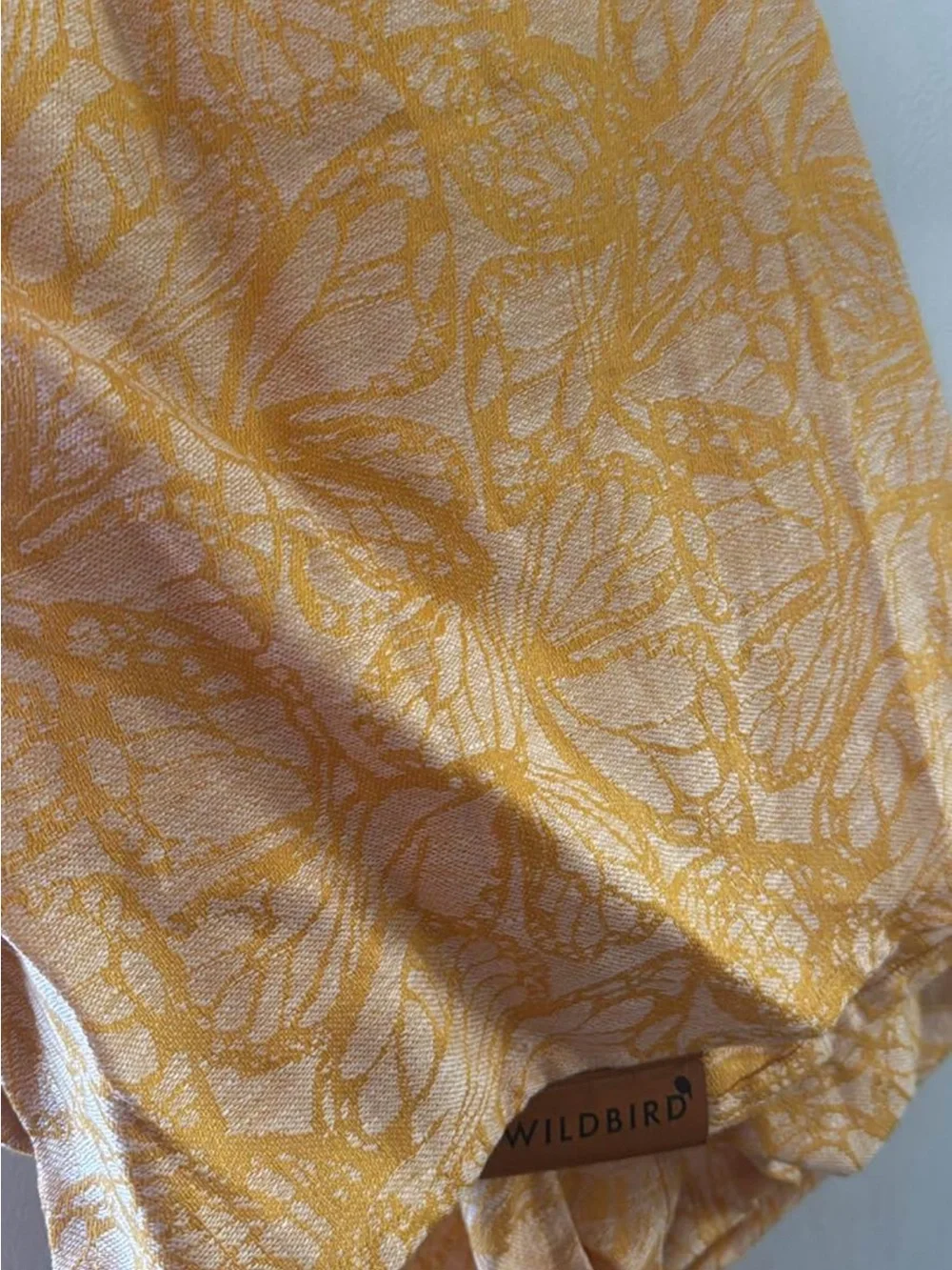 WildBird Yellow and White Kids Sling with butterfly pattern